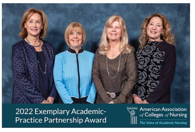 Faculty accepting 2022 Exemplary Academic Practice Partnership Award